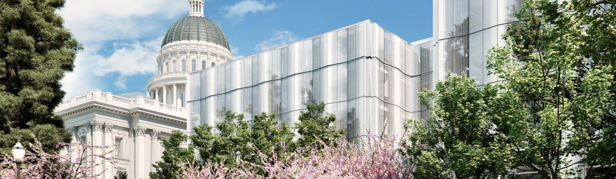 Rendering of the new glass Annex exterior next to the historic Capitol, framed by pink flowering trees.