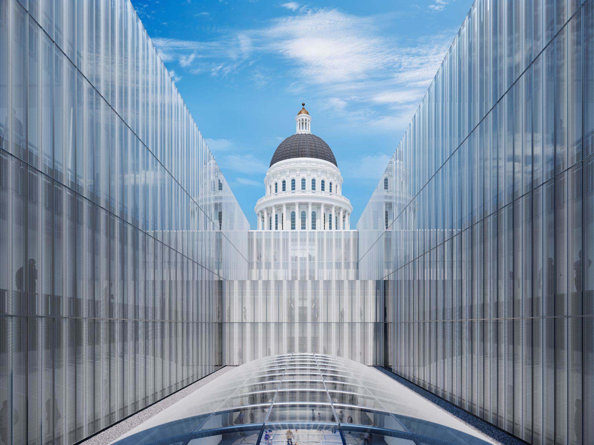Architectural rendering of the new Annex interior atrium, featuring a glass ceiling that allows natural light to illuminate the white stone walls.