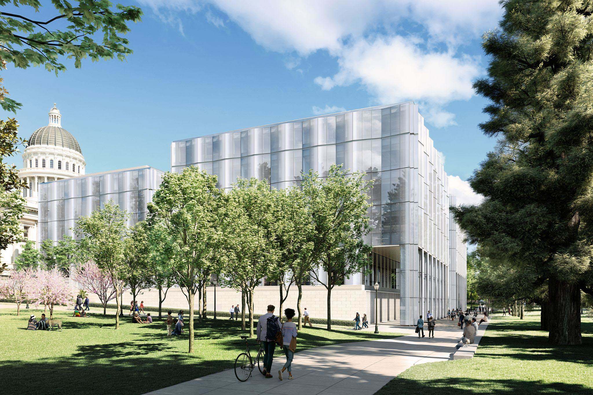 Architectural rendering showing the modern glass exterior of the new Annex, highlighting the recessed entryway and vertical glass columns.